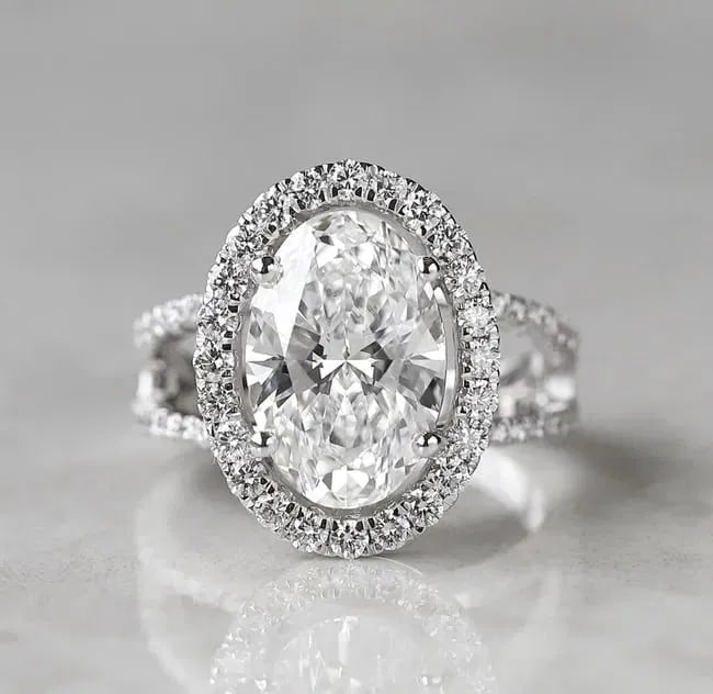 Certified 5.00 Carat Oval Cut 14kt Solid White Gold Lab Grown Diamond Ring: Certified Lab Grown Diamond Ring , Side stones 0.50 ct F Color VS1 - Central Stone 5.00 Carat Oval cut E VVS1 , 14Kt White Gold Ring size - 7 Engagement Ring, Setting Style - Solitaire with Accents, S