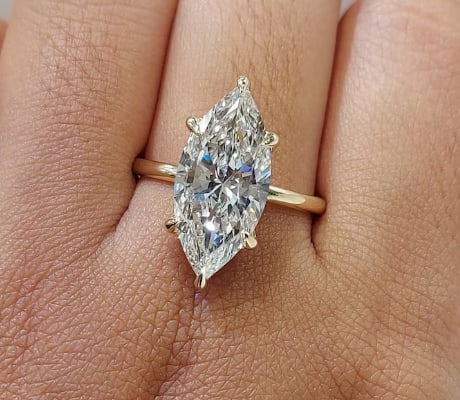 Certified 5.00 Carat Marquise Lab Grown Diamond 14kt Solid Yellow Gold Engagement Ring: Certified 5.00 Carat Marquise D VVS1 Lab Grown Diamond 14kt Solid Yellow Gold Engagement Ring - Side Stone is Lab Grown Diamonds VS1 E Color Round Cut 0.40 CT - Ring Size US 7.5 ..