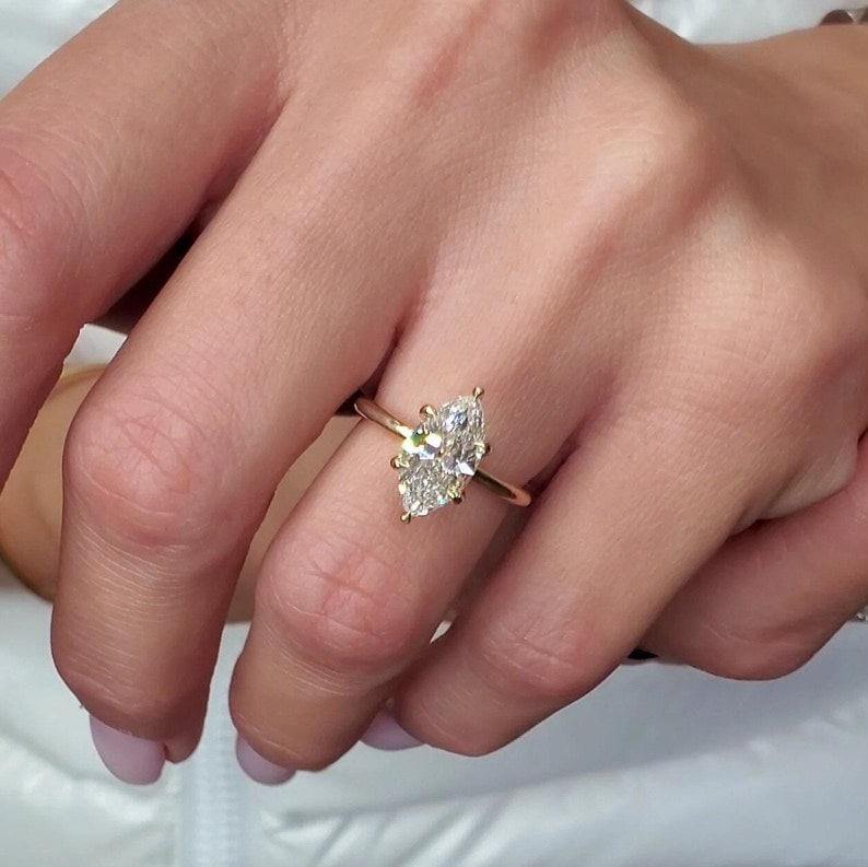 Certified 3 Carat Marquise Cut Lab Grown Diamond D VVS1 Color 14kt Solid Yellow Gold Engagement Ring: Certified 3 Carat Marquise Cut Lab Grown Diamond D VVS1 Color 14kt Solid Yellow Gold Engagement Ring - Side Stone Lab Grown Diamonds 0.40 CT Round Cut VS1 E Color - Ring Size US 6