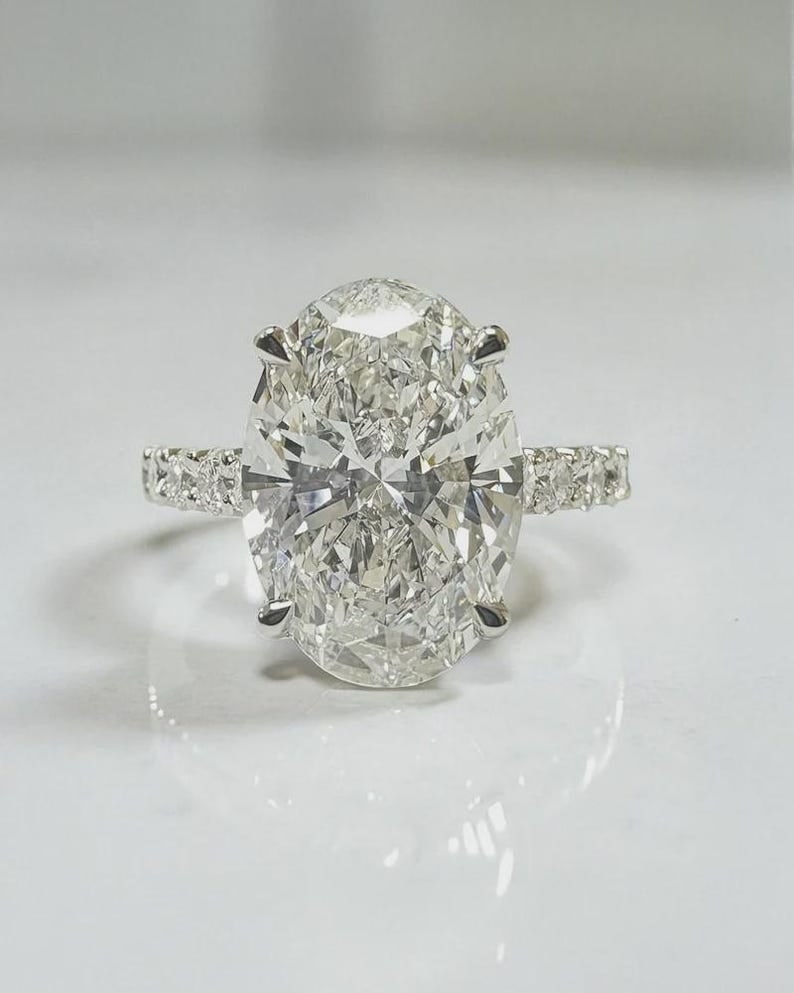 5.00 Carat Oval Cut Certified D VVS1 Lab Grown Diamond in 14KT Solid White Gold Engagement Ring: 5.00 Carat Oval Cut Certified D VVS1 Lab Grown Diamond in 14KT Solid White Gold Engagement Ring - Side Stone Lab Grown Diamonds VVS1 D color Round cut 0.80 ct - Excellent Luster - Ring Size US 7