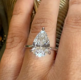 4.00 Carat Pear Cut Certified D VVS1 Lab Grown Diamond in 14KT Solid White Gold Engagement Ring: 4.00 Carat Pear Cut Certified D VVS1 Lab Grown Diamond in 14KT Solid White Gold Engagement Ring - Side Stone Lab Grown Diamonds VVS1 D Color Round 0.30 Ct - Ring Size US - 7