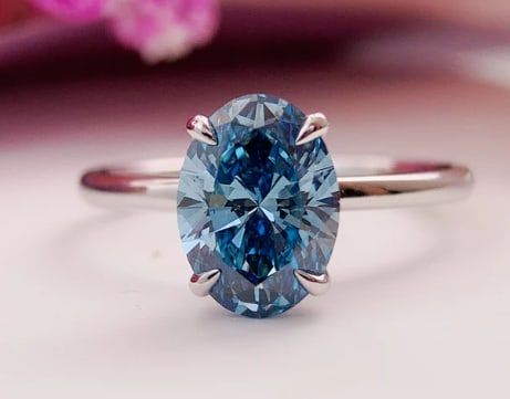 Certified 3.00 Carat Oval Blue VVS1 Lab Grown Diamond Engagement Ring in 14K White Gold | Pavé: 3.00 Carat Oval Blue VVS1 Lab Grown Diamond Engagement Ring in 14K White Gold | Pavé Diamond Band | Luxury Promise Ring | Side Stone Lab Grown Diamonds VVS1 D Color Round Cut 0.20 ct - Ring Size US 7