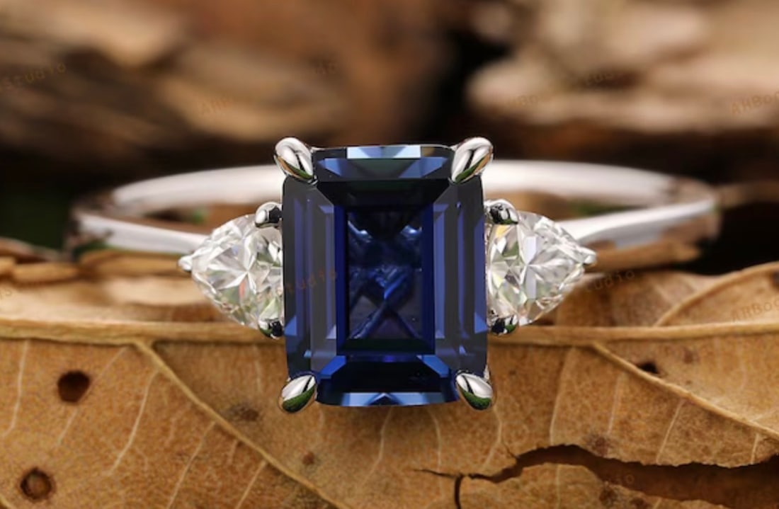 Certified 4.00 Carat Emerald Cut Lab Grown Blue Sapphire Engagement Ring in 14K White Gold Three: Certified 4.00 Carat Emerald Cut Lab Grown Blue Sapphire Engagement Ring in 14K White Gold Three Stone Ring | Luxury Promise Ring |Side Stone Lab Grown Diamonds VVS1 D Color Pear Cut 1.00 ct - Ring Si