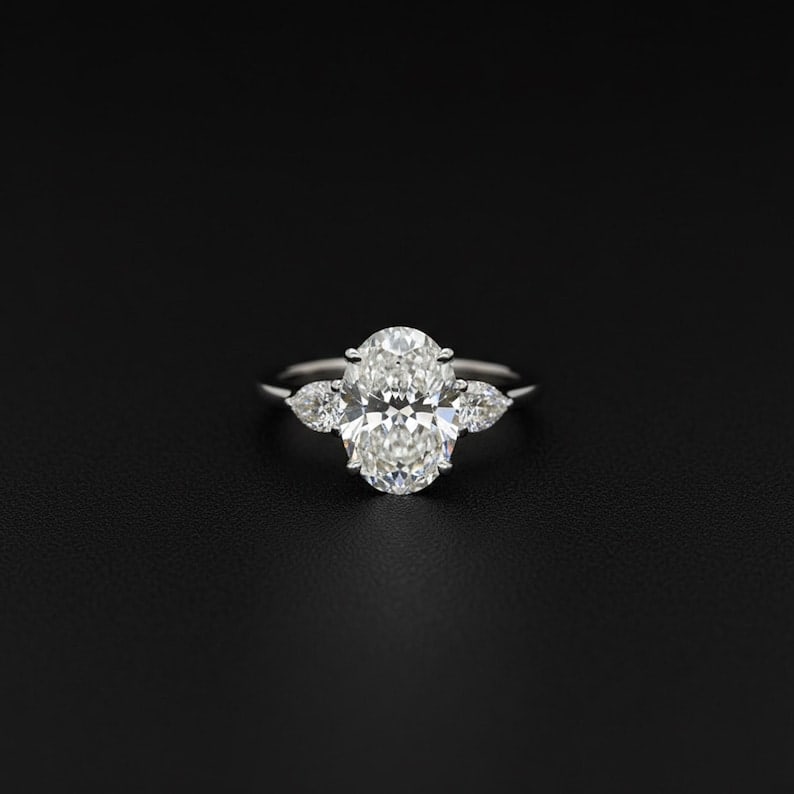 Certified 3.50 Carat Oval Cut D VVS1 Lab Grown Diamond 14KT White Gold Engagment Ring| Three Stone: Certified 3.50 Carat Oval Cut D VVS1 Lab Grown Diamond 14KT White Gold Three Stone Ring | Side Stone Lab Grown Diamonds VVS1 D Color Pear Cut 0.60 ct - Ring Size US 7