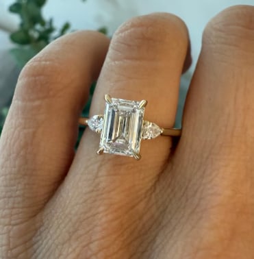 Certificted 4.00 Carat Emerald Cut D VVS1 Lab Grown Diamond 14k Rose Gold Three Stone Ring: Certificted 4.00 Carat Emerald Cut D VVS1 Lab Grown Diamond 14k Rose Gold Three Stone Ring| Side Stone Lab Grown Diamonds VVS1 D Color Pear Cut 0.60 ct - Ring Size US 7