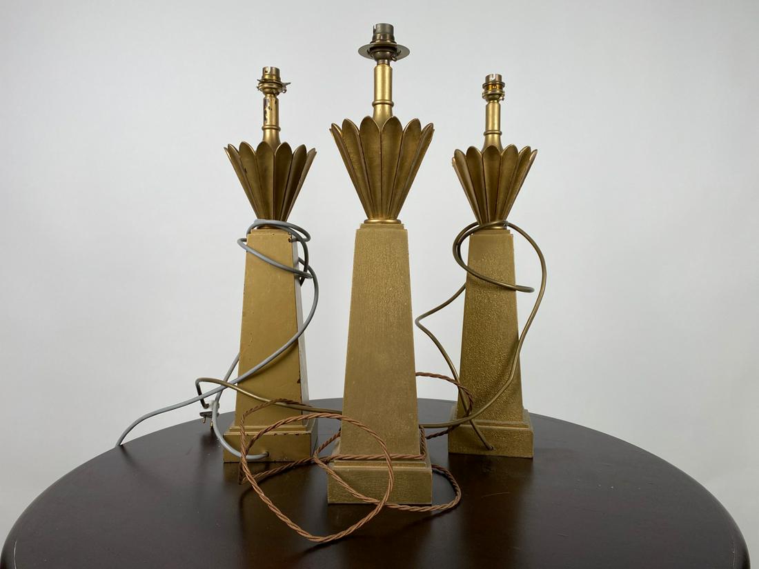 Set of 3 Art Deco Style Table Lamps: Set of 3 Art Deco Style Table Lamps Wooden Matt Bronze Effect Various plugs as shown Some damage Untested Approximate Dimensions: Height - 53cm Width - 12cm Location - 10-D4-1