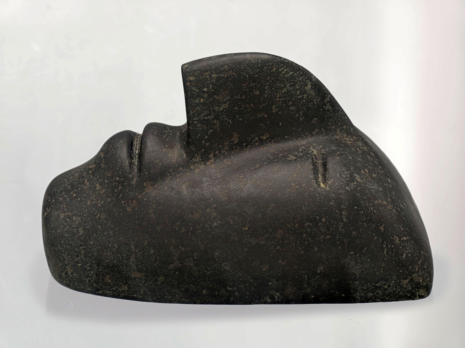 Ancient Mesoamerican Stone Head Mask With Bold Features (1 of 5)