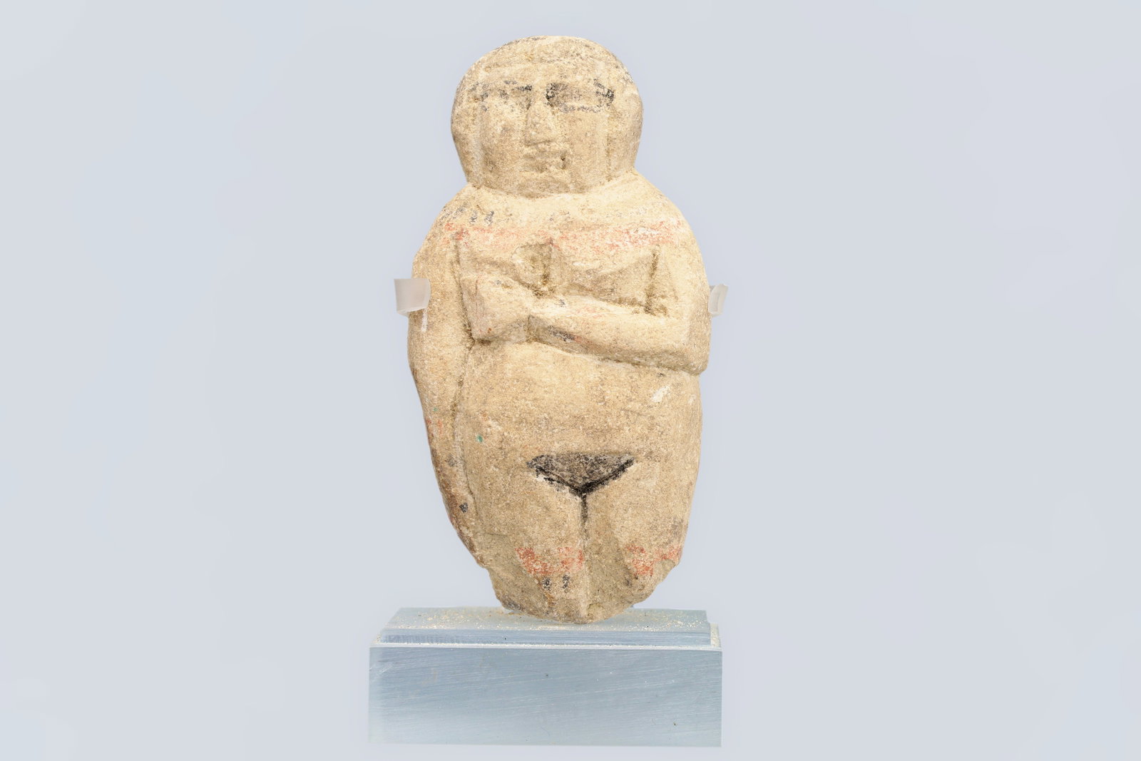 Ancient Egyptian Limestone Figure Of A Concubine Girl, New Kingdom 12th Century AD: Ancient Egyptian Limestone Figure Of A Concubine, New Kingdom 12th Century BC, Unusual Carved Limestone Figure Of Nude Woman With Right Hand Covering Left Breast, Traces Of Original Paint. Fine Detail