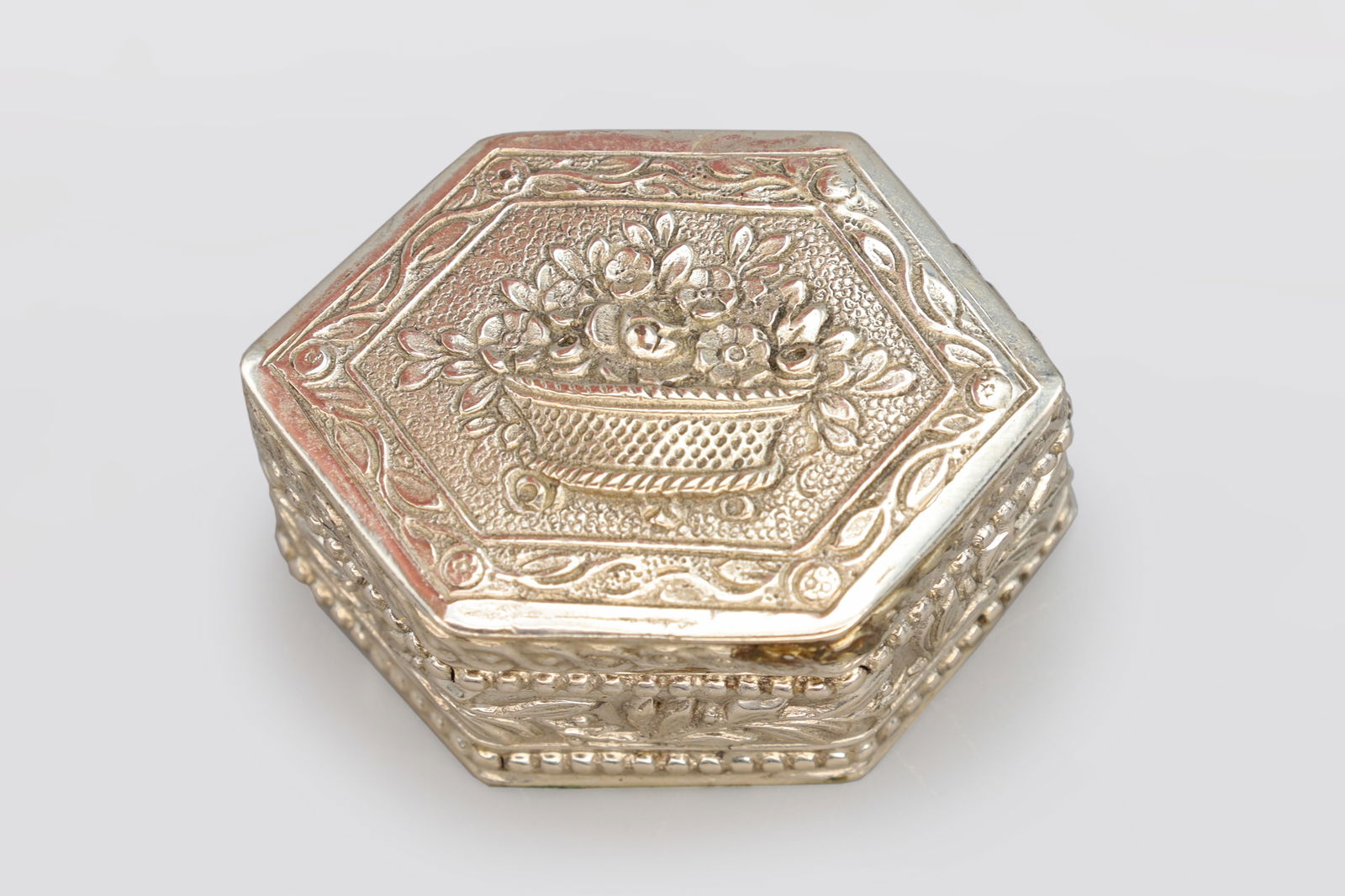 Small Dutch Silver Pill Box With Embossed Floral Motif All Around, Hexagon Shape (1 of 6)