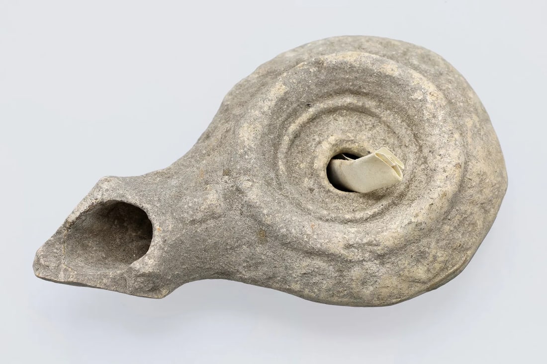 Holy Land Terracotta Oil Lamp, Palestine Under Roman Empire, Circa 3rd Century AD, Antiquities Art: Ancient Iron Age Period. A Holy Land, Levant Domestic Lamp. Ancient Pale Tones Terracotta Oil Lamp From Palestine Under Roman Empire, Circa 3rd Century AD. Dimensions Length 3.75 inches. Very Good Con