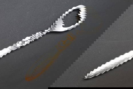 Georg Jensen, Denmark, Sterling Silver And Steel, Bottle Opener, Cactus Cutlery 1930s Hallmarks: Georg Jensen, Denmark, Sterling Silver Handle And Stainless Steel. Hallmarked. Model Named CACTUS, Serveware Cutlery From The 1930s. Vintage. Refer to photos and description. DISCLAIMER: Read The Desc