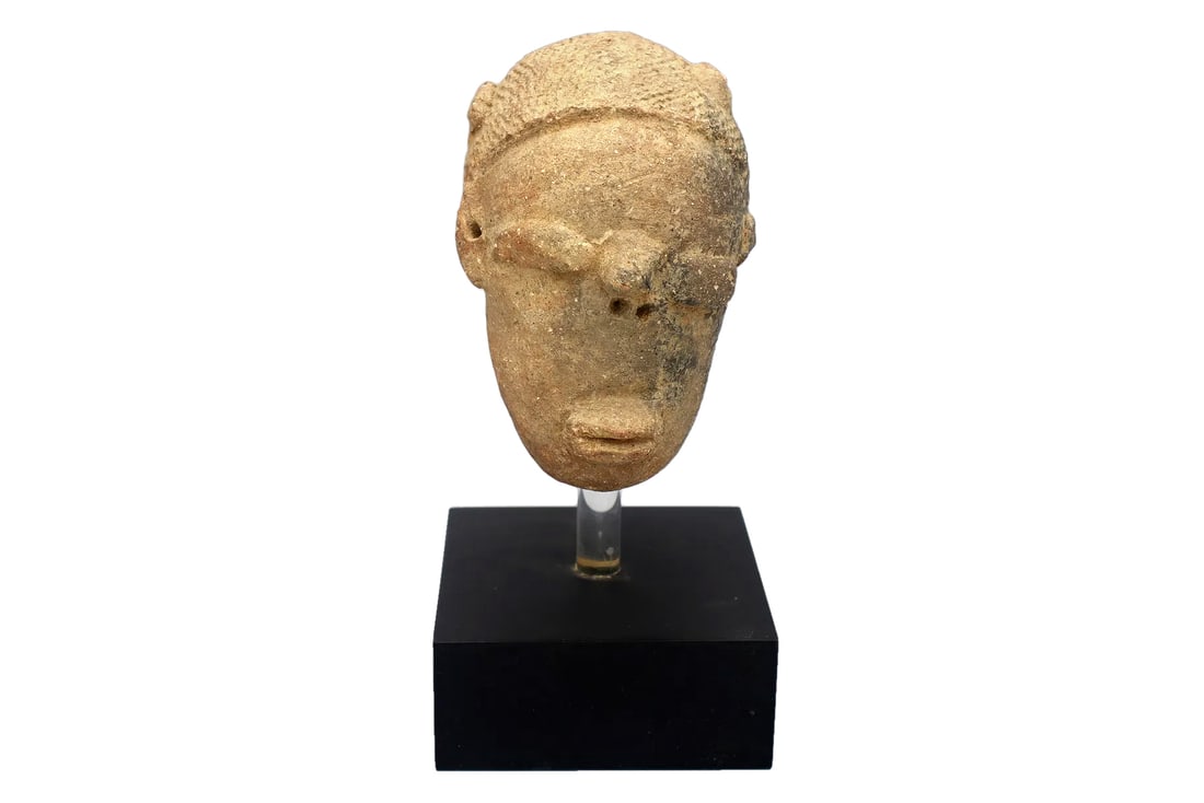 Ancient NOK Civilization Terracotta Burial Female Sculpture With Stand, A Head Figure 200 BCE: Very Beautiful And RARE Female Head, Fragment Of A Larger Figure Of A Woman Most Probably A Burial Item From Africa And Dated Around 200 AD. The Portrait Represents A Woman With A Very Mysterious Face
