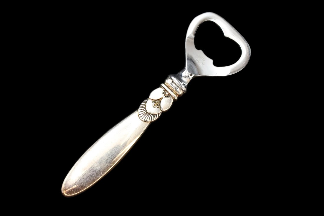 Georg Jensen, Denmark, Sterling Silver And Steel, Bottle Opener, Cactus Cutlery 1930s Hallmarks: Georg Jensen, Denmark, Sterling Silver Handle And Stainless Steel. Hallmarked. Model Named CACTUS, Serveware Cutlery From The 1930s. Vintage. Refer to photos and description. DISCLAIMER: Read The Desc