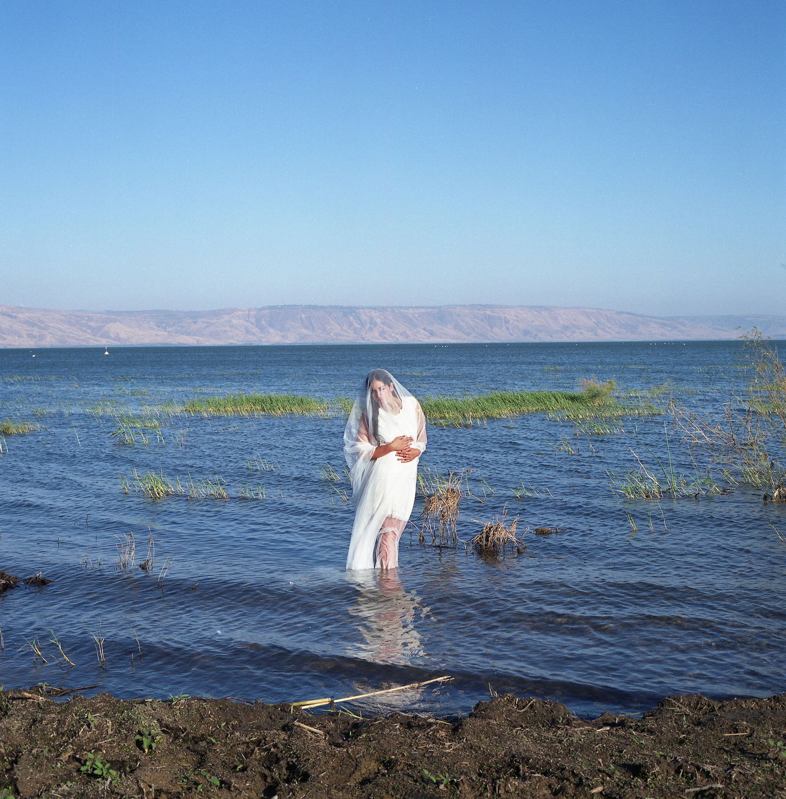 Kineret, Galilee, Hasselblad Photo Print 24 x 24 in, Signed, Israeli Contemporary Artist Naama Sarid: Title: A White Phantom. Kineret, Israel 2012. Hasselblad camera, 100iso Color Film. Color Medium Format Analogue Photography, Israeli Female Model, Portrait in landscape, Middle Eastern Visual Poetry,