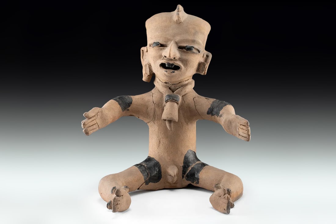 Ancient Pre Columbian Veracruz Pottery Male Sitting Figure, Remojadas Art cae 450 to 600 AD, Mexico: Dimensions 12 x 10.85 x 13.5 inches Equivalent to 30.5 cm x 27.4 cm x 34.3 cm. Largest measurement is the height. All measurements are approximate. Provenance: private Burbank, Illinois, USA collectio