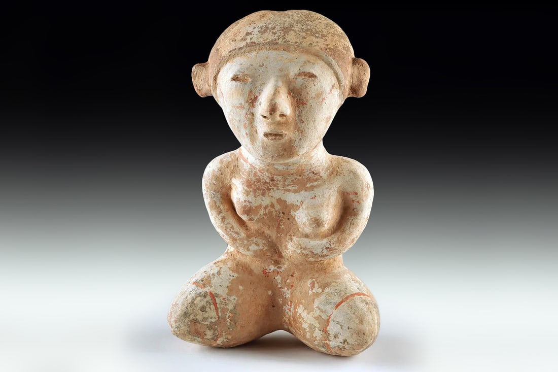 Ancient Pre Columbian Nayarit Pottery Female Sitting Figure, Chinesco 300 BCE to 300 AD, Mexico: Dimensions, 3.25 x 5.125 x 7.85 inches, equivalent to 8.1 x 13 x 20 cm. All measurements are approximate. Provenance: private Sheffield, Massachusetts, USA collection. Currently Private NYC. Pre-Colum