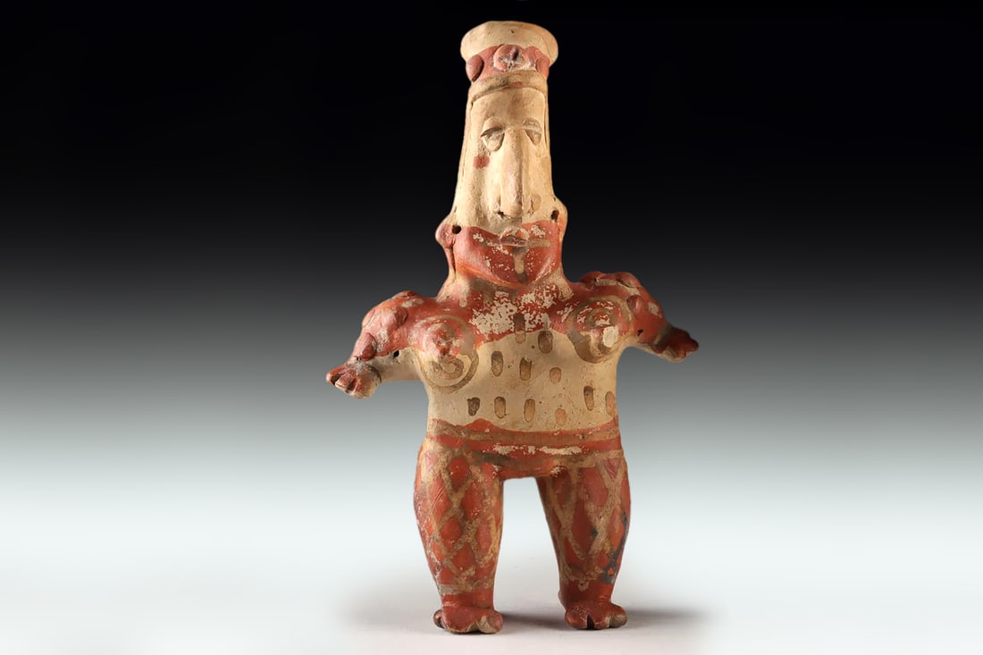 Ancient Pre Columbian Jalisco Pottery Female Standing Figure With Long Head, Ca 300 BCE to 300 AD: Pre-Columbian Civilizations Of West Mexico, Jalisco, Circa. 300 BCE To 300 AD. A Jalisco Pottery Standing Nude Female Figure Presents A Striking Study In Its Form, Representational Symbolism, And Regi