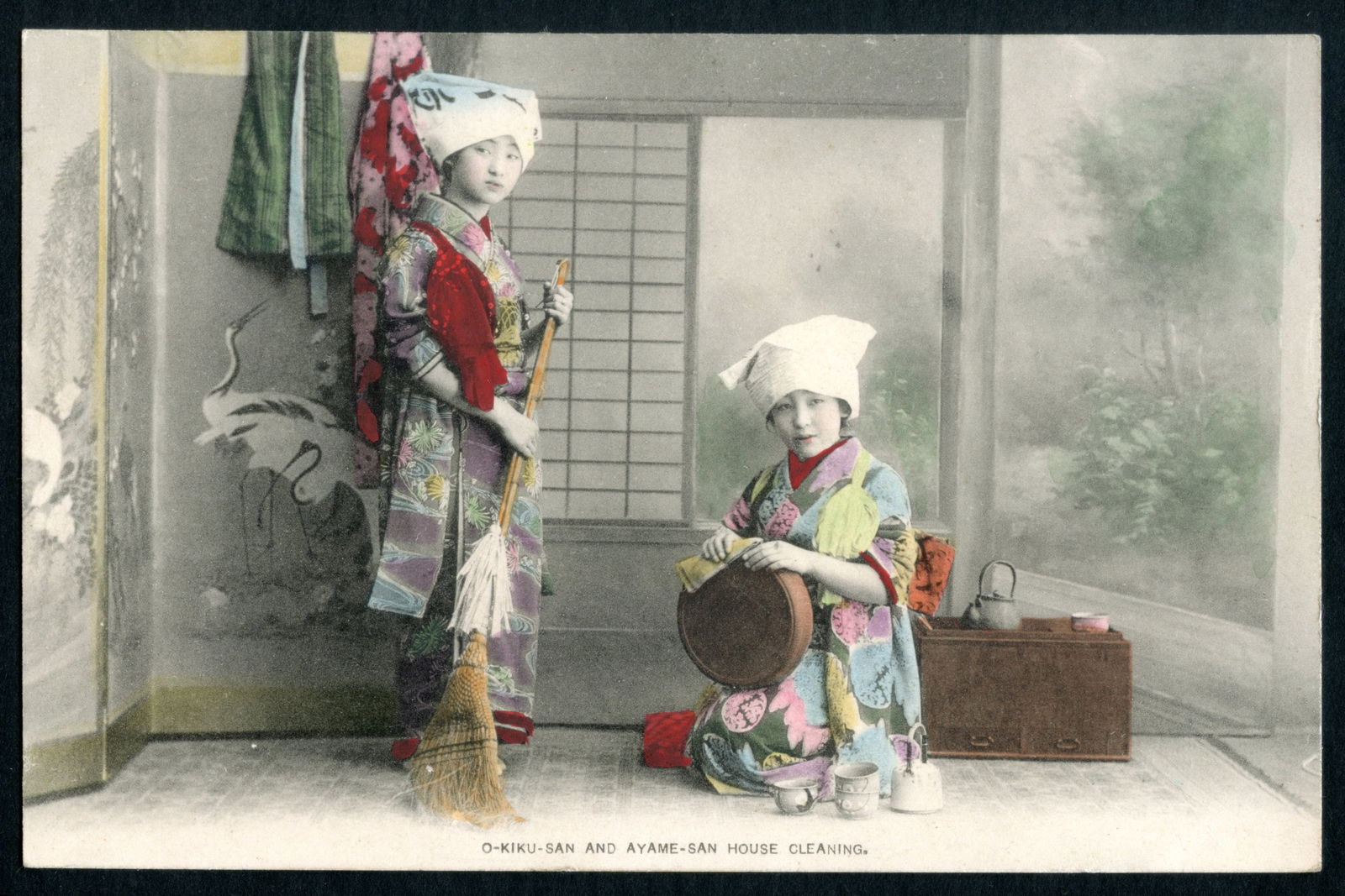 Uncirculated Postcard From Meiji Japan, Early 20th Century Hand Colored Postal Memorabilia, NOS: Dimensions 5.5 x 3.5 inches. All measurements are approximate. Sold Exactly As Pictured. NOS. Uncirculated Postcard From Japan, Early 20th Century Hand Colored Postal Memorabilia, OkikuSan And AyameSa