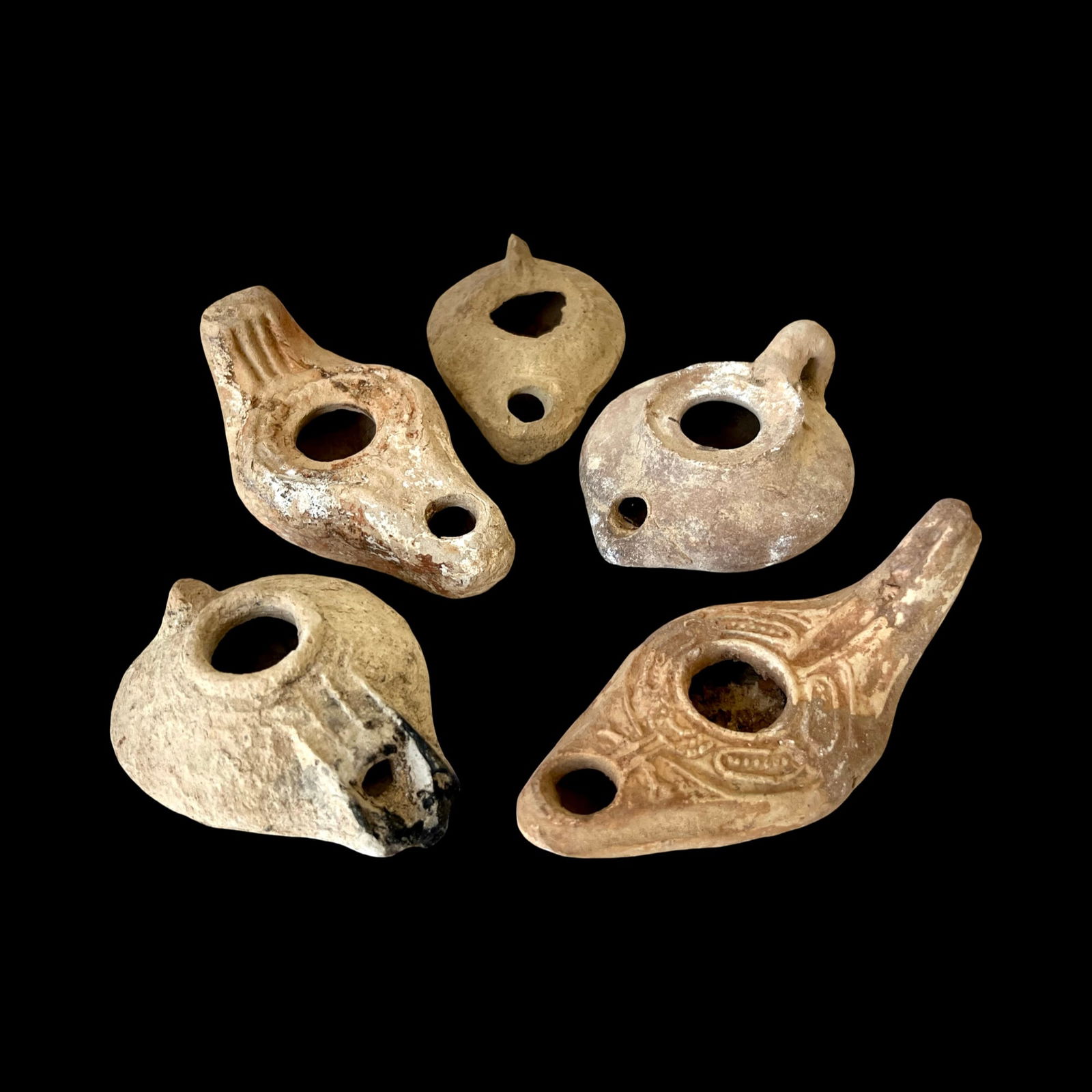 Ancient Roman Clay Oil Lamps, Group Of Five. Antique. Refer to photos and description. Sold as is.: Ancient Roman Empire Terracotta Oil Lamps, Group Of Five 5 Units, Small Clay Oil Lamp, Circa, 1st to 4th century AD, nice designs. Size: 12 cm - 10 cm Ex private FL Collection. // Disclaimer: Read The