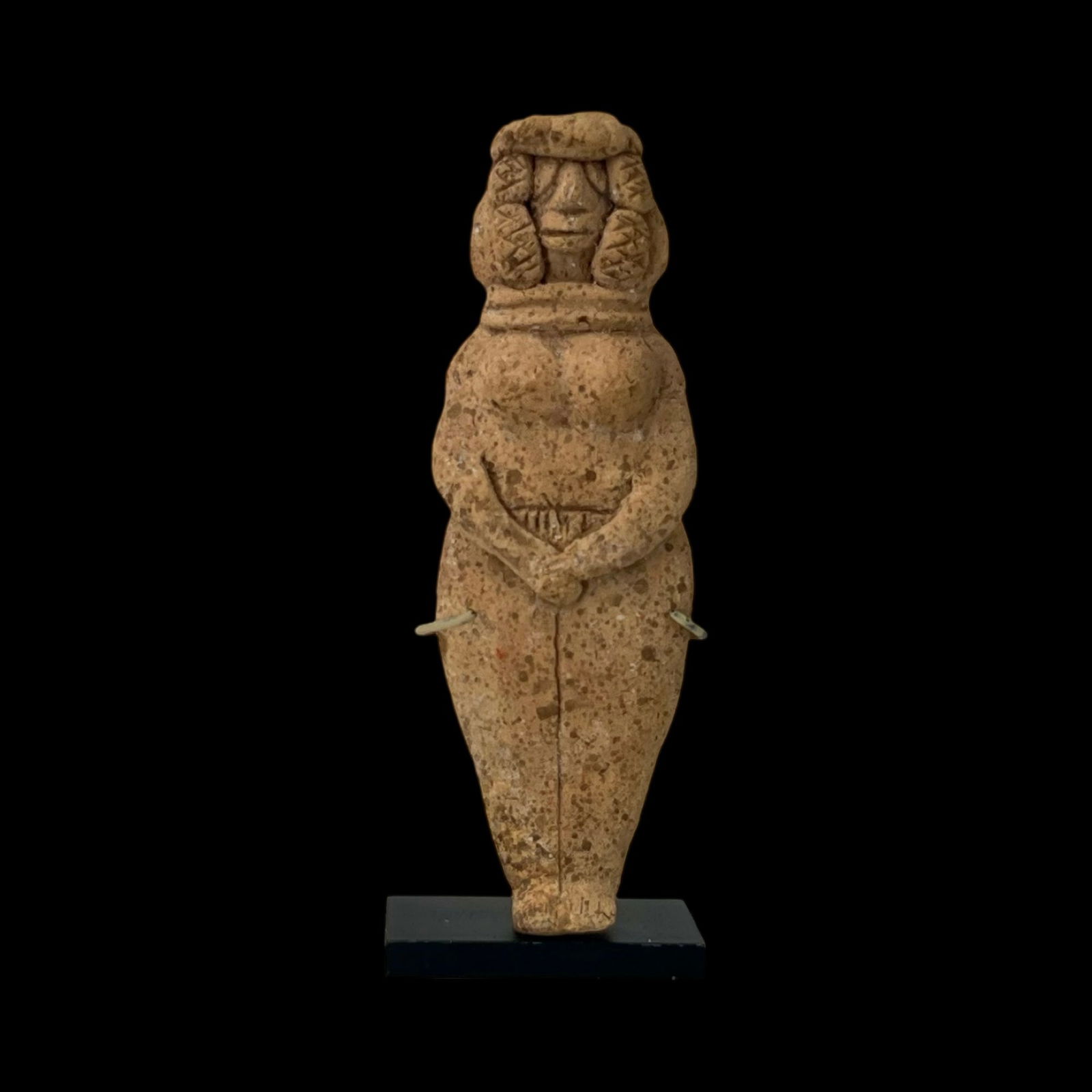 Near Eastern terracotta plaque depicting Astarte. Antiquities And Collectibles, History: Near Eastern terracotta plaque depicting Astarte. circa 1500-1000 BCE. Size 5 5/8 inches high. + mount. Fine mold made clay fertility idol with both hands holding her breast, fine details. Size:13 cm
