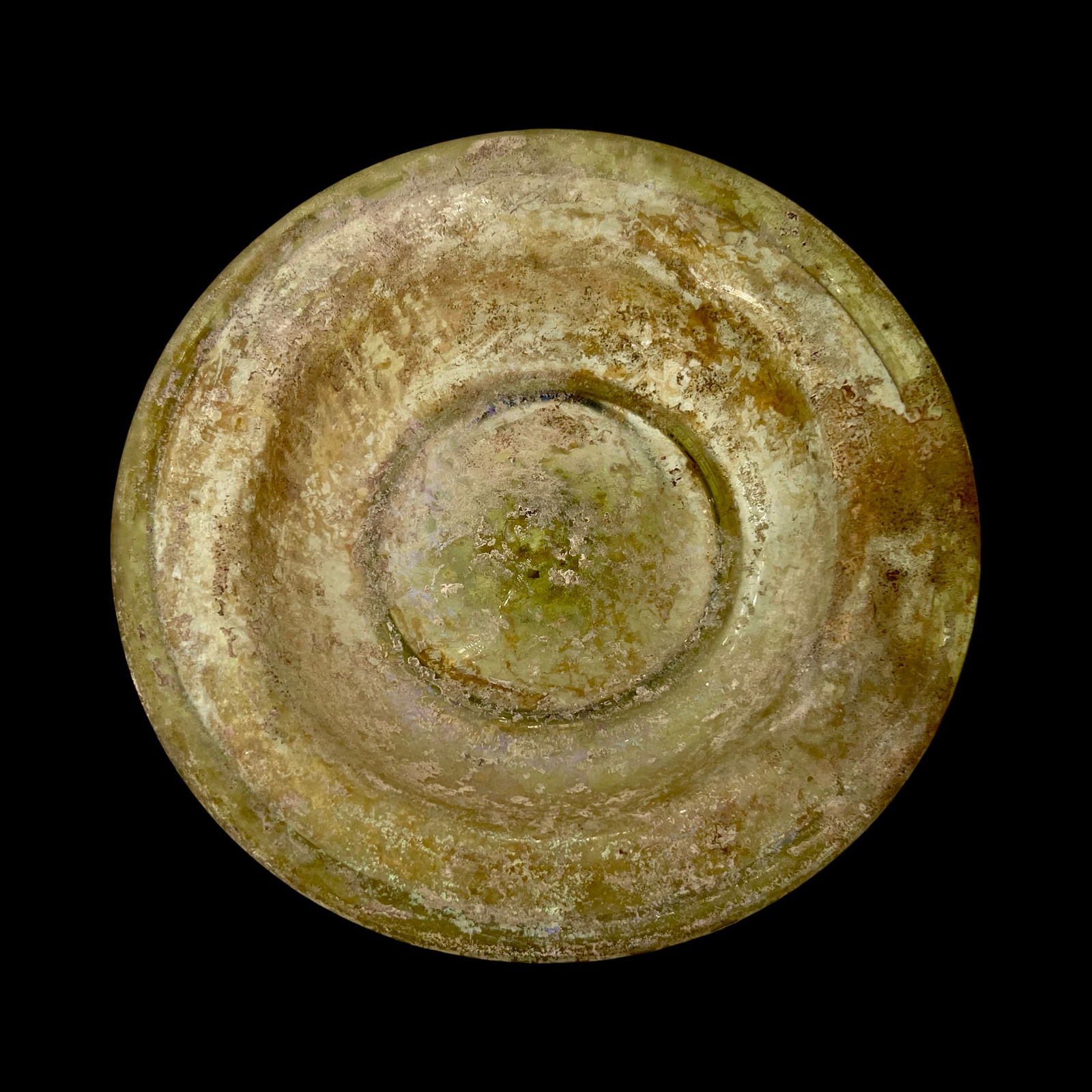 Ancient Roman Green Footed Glass Bowl.: Ancient Roman Green Footed Glass Bowl Holyland, Circa 2nd to 3rd Century AD. Elegant free blown pale yellow-green glass shallow bowl or plate with low ringpedestal foot and a tooled fire polished rim.