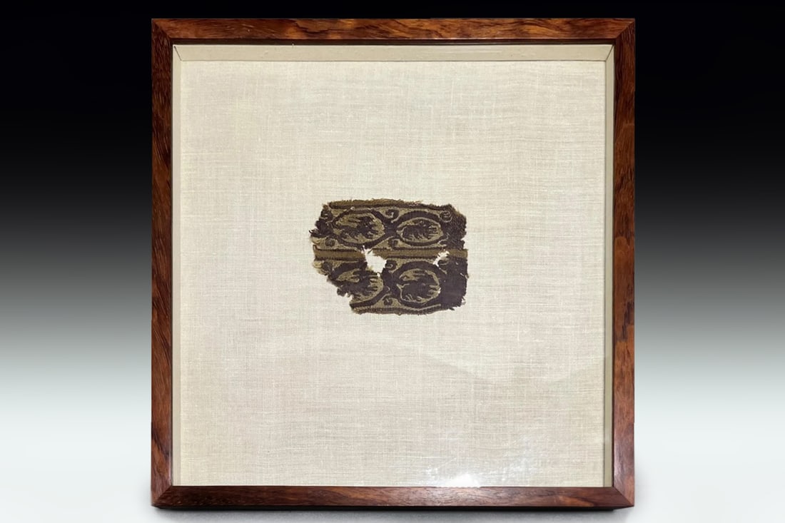 Ancient 7th Century AD, Christian Coptic Egypt Textile Fragment, Abstract Embroidered Pattern: An Ancient 7th Century AD, Early Medieval Period In North Africa, A Christian Coptic Egypt Textile Fragment From A Burial Place With An Abstract Pattern Motif. Some Obvious Influences From Ancient Rom