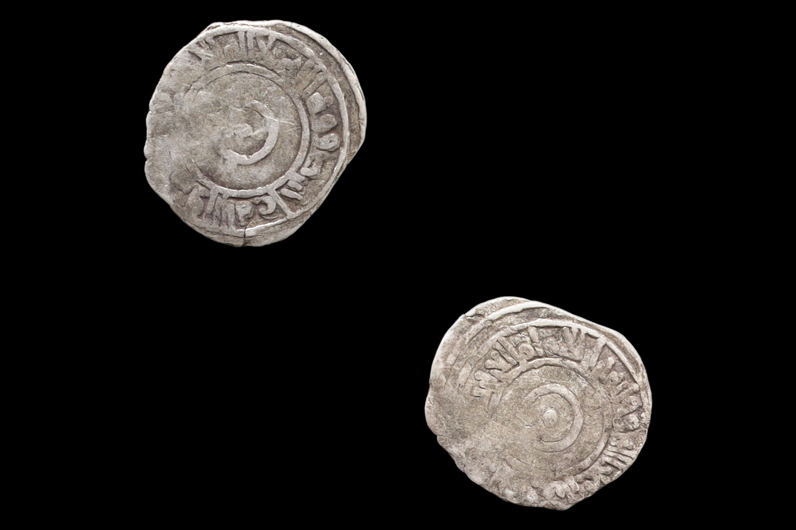 Medieval Egypt, Fatimids, al-Aziz Billeh, Fractional Value Of Half Dirham, Islamic Silver Coin Dinar: Dimensions, Diameter 12 mm. Weight 0.6 grams. All measurements are approximate. Sold as pictured. // Medieval Egypt, Fatimids, al-Aziz Billeh, Fractional Face Value Of Half Dirham, Silver Coin With Ar