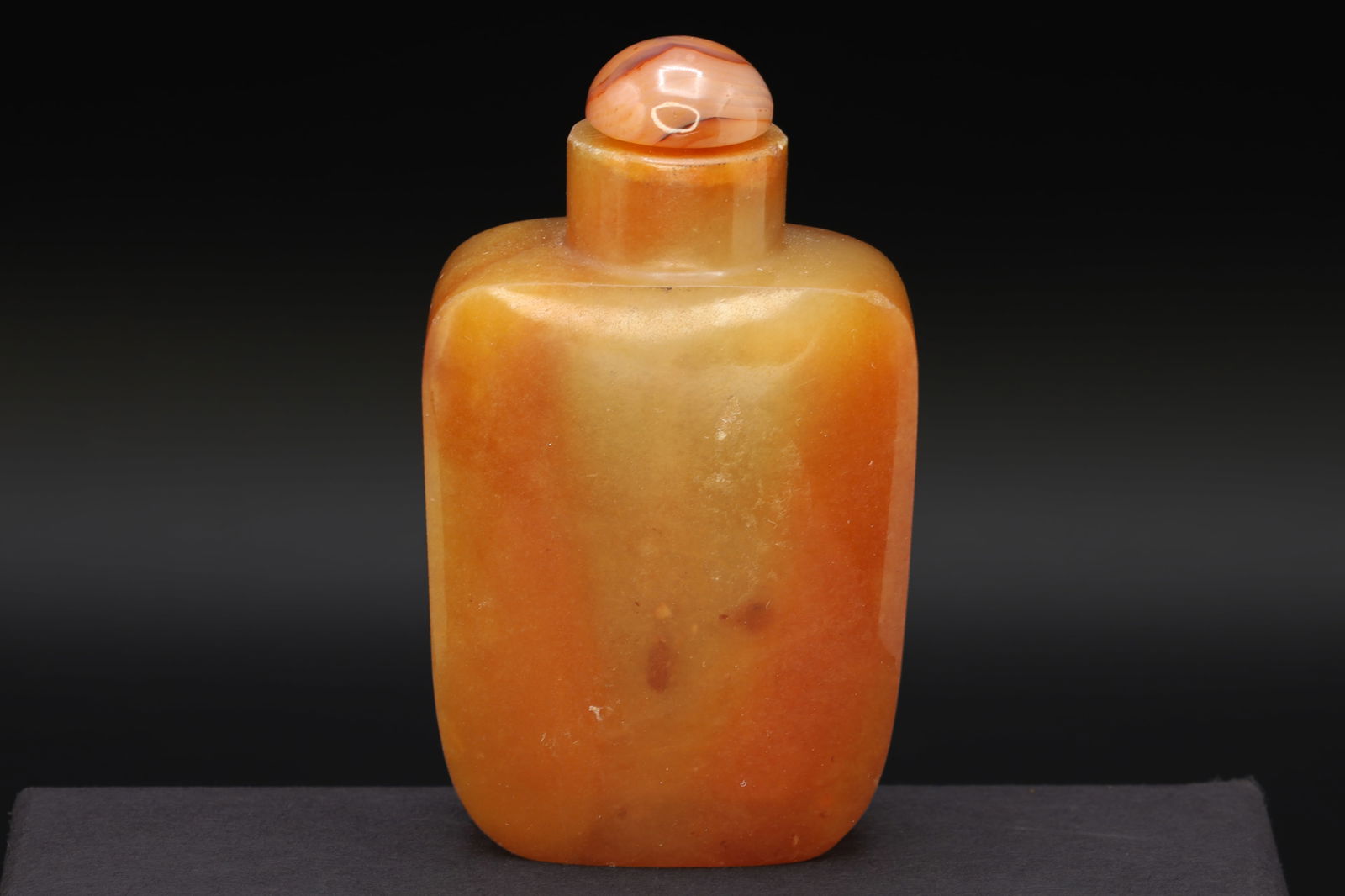Vintage Early 20th Century Snuff Bottle, Hand Carved Apricot Agate Stone, Small Perfume Bottle. Asia: Dimensions, Height 2.5 inches. All measurements are approximate. Condition: Very Good Vintage. Normal Manufacture Imperfections. Natural stone lines and inclusions. Refer to photos and description.