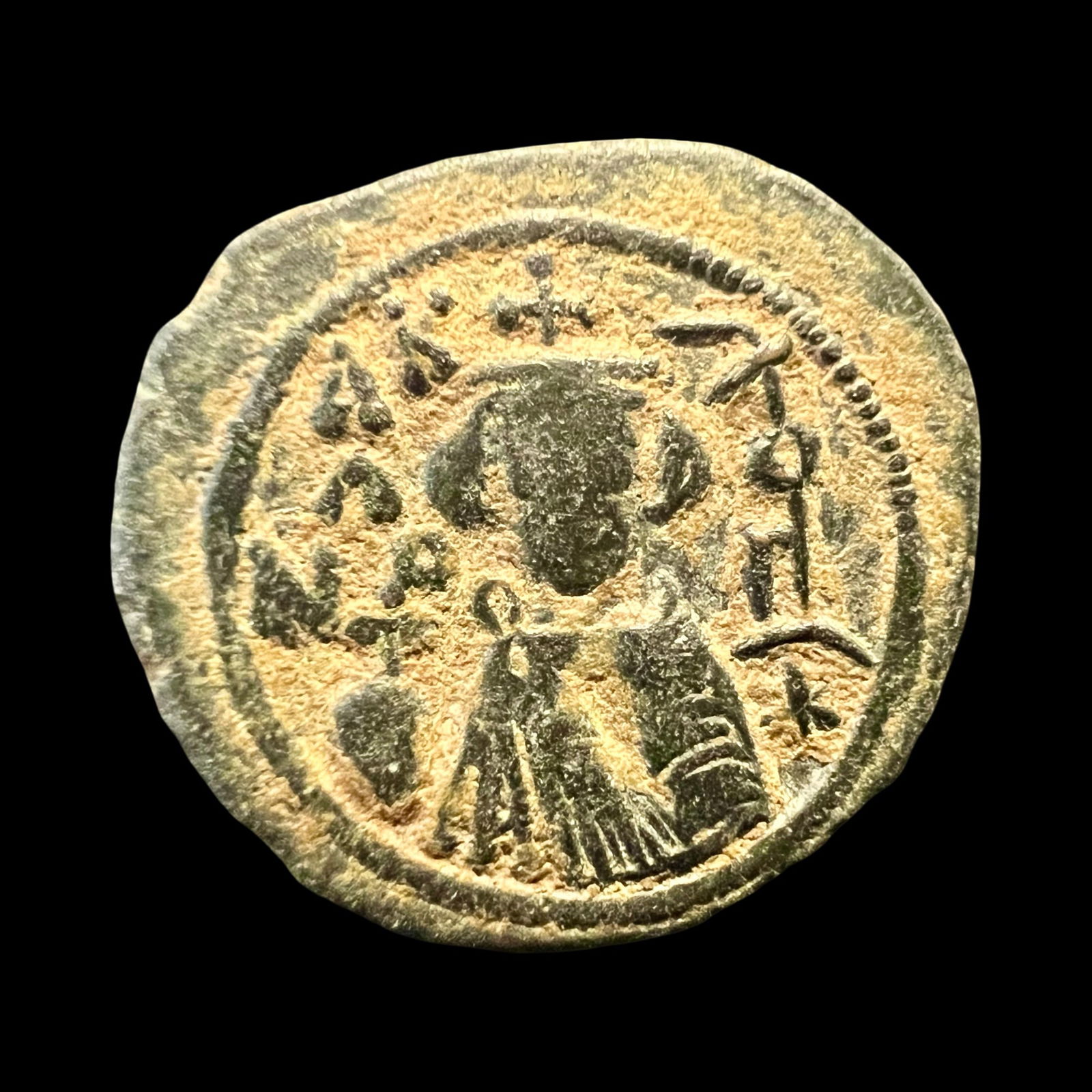 Arab Byzantine Fals Coin, circa AH 19-39 / AD 641-660. Ancient Numismatics And Collectibles: ARAB-BYZANTINE, AE fals. Hims (Emesa), 4.6 grams, Diameter 22 mm. Facing imperial bust, holding globus cruciger to left, bi-hims to right. R: arge m; star between two scroll ornaments above, VF. // An