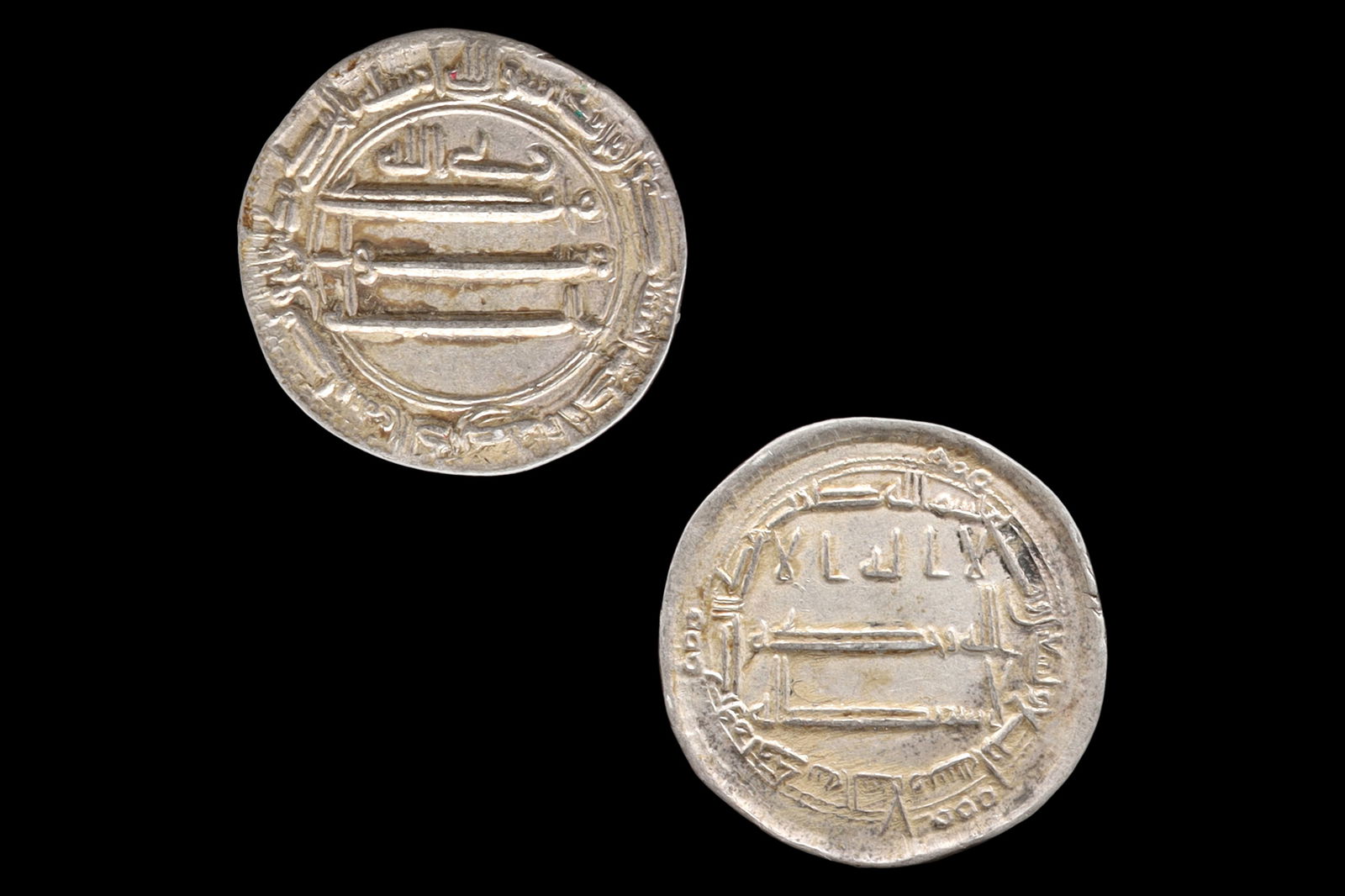 Medieval Islamic Silver Coin, Abbasid Caliphate Madinat Al Salam, Late Al Rashid Dirham, Middle East: Dimensions, Diameter 21mm, Weight 2.98 grams. All measurements are approximate. Patina, Surface Wear And Aging. Sold As Pictured. A Very Fine Islamic Empire, Abbasid Caliphate Silver Dirham Coin Under