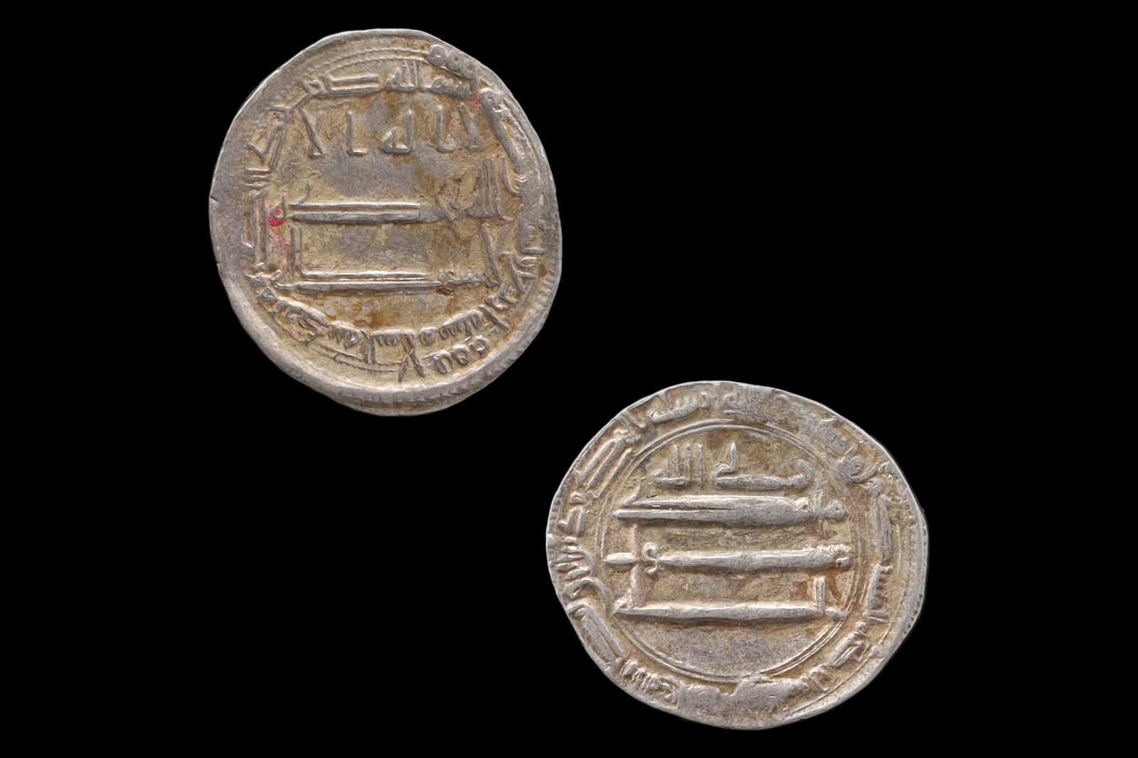 Medieval Islamic Silver Coin, Abbasid Caliphate Madinat Al Salam, Late Al Rashid Dirham, Middle East: Dimensions, Diameter 21mm, Weight 2.92 grams. All measurements are approximate. Patina, Surface Wear And Aging. Sold As Pictured. A Very Fine Islamic Empire, Abbasid Caliphate Silver Dirham Coin Under