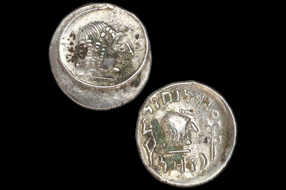 Ancient 1st Century AD Himyarite Kingdoms, South Arabia Felix Silver Quinarius Coin, Raydan Scyphate: Dimensions, Diameter 14 mm, Weight 160 grams. All measurements are approximate. Ancient Himyarite Kingdoms, South Arabia Felix Silver Quinarius Coin, Raydan Scyphate Mint. Dated As Mid 1st Century To