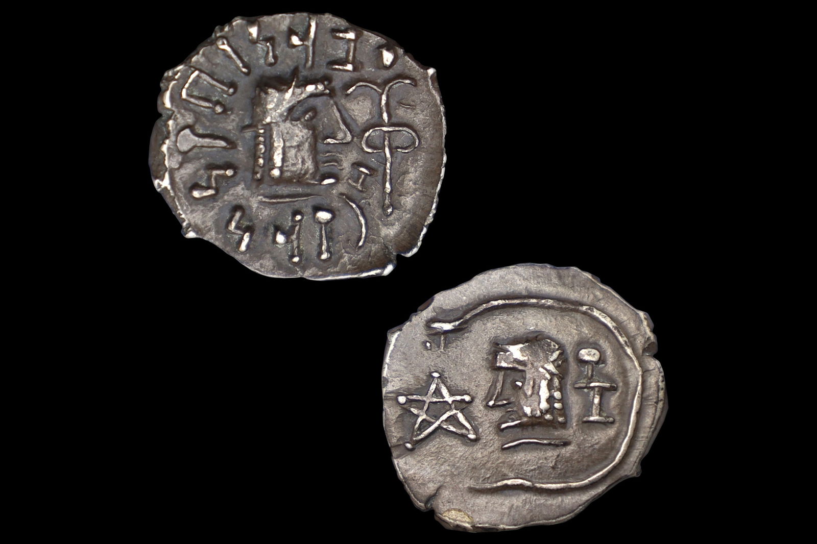 Ancient 1st Century AD Himyarite Kingdoms, South Arabia Felix Silver Quinarius Coin, Raydan Scyphate: Dimensions, Diameter 14 mm, Weight 1.09 grams. All measurements are approximate. Ancient Himyarite Kingdoms, South Arabia Felix Silver Quinarius Coin, Raydan Scyphate Mint. Dated As Mid 1st Century To