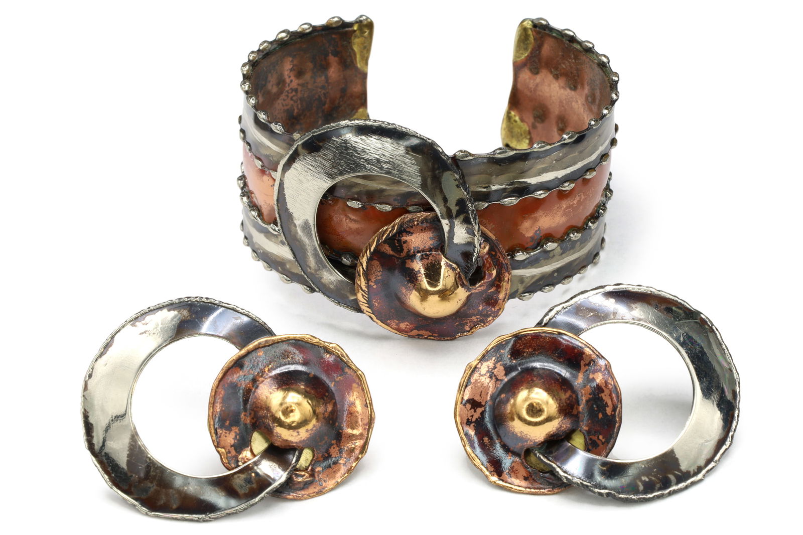 Jewelry Set By Ndebele Women Of South Africa, A Cuff Bracelet And Large Pierced Stud Earrings: Dimensions, Cuff Inner 2.5 x 2 inches, Width 1.25 inches; Earrings 2 x 1.5 inches. All measurements are approximate. Sold exactly as pictured. Jewelry Set By Ndebele Women Of South Africa, A Cuff Brac