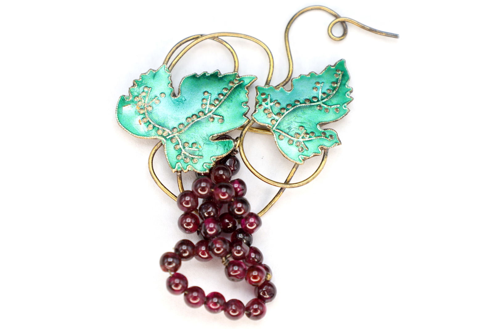 Grapes And Vine Brooch, Vintage 1970s Figural Jewelry, Vermeil Sterling Silver, Garnet, Green Enamel: Dimensions 5.25 x 4.25 inches. All measurements are approximate. Sold as pictured, surface wear and aging, lost gilt. Grapes And Vine Brooch, Vintage 1970s Figural Jewelry, Vermeil 925 Sterling Silver