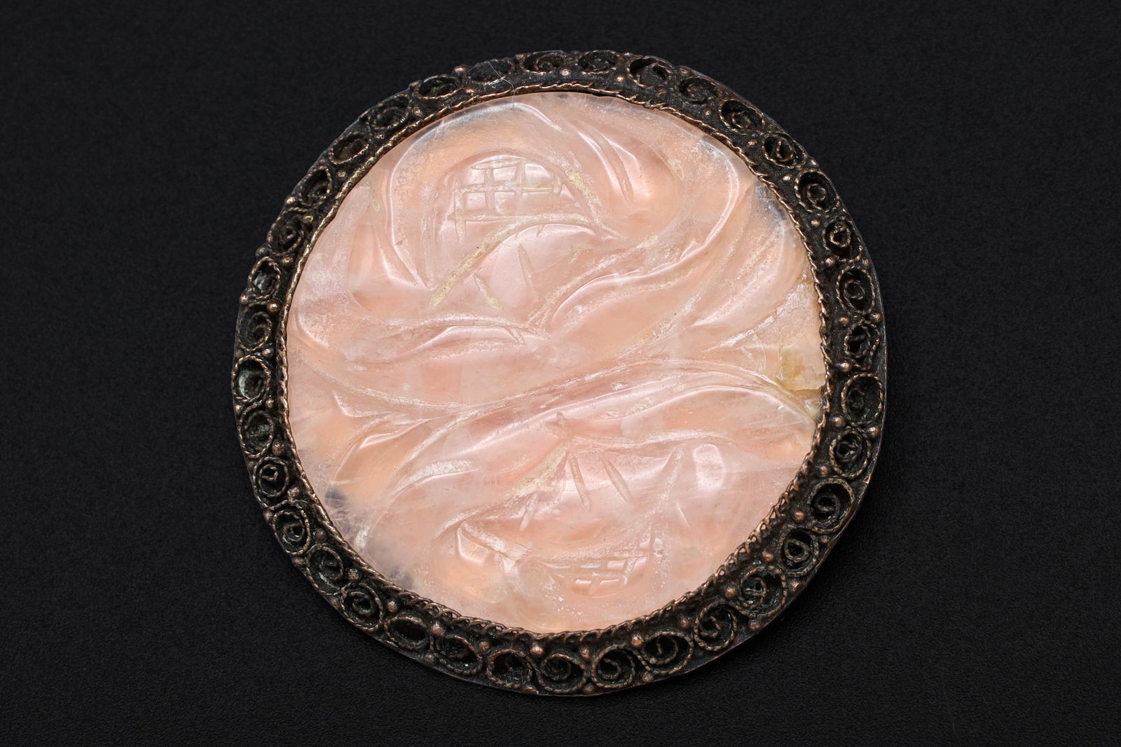 Antique 1920s Art Deco Brooch, A Carved Rose Quartz And Silver Filigree Wirework, Chinese Republic: Dimensions, Diameter 2 inches, All measurements are approximate. Patina, Lost of plated finish, Surface wear and aging. Sold as pictured. Seems to be a silver based allow. Antique 1920s Art Deco Brooc