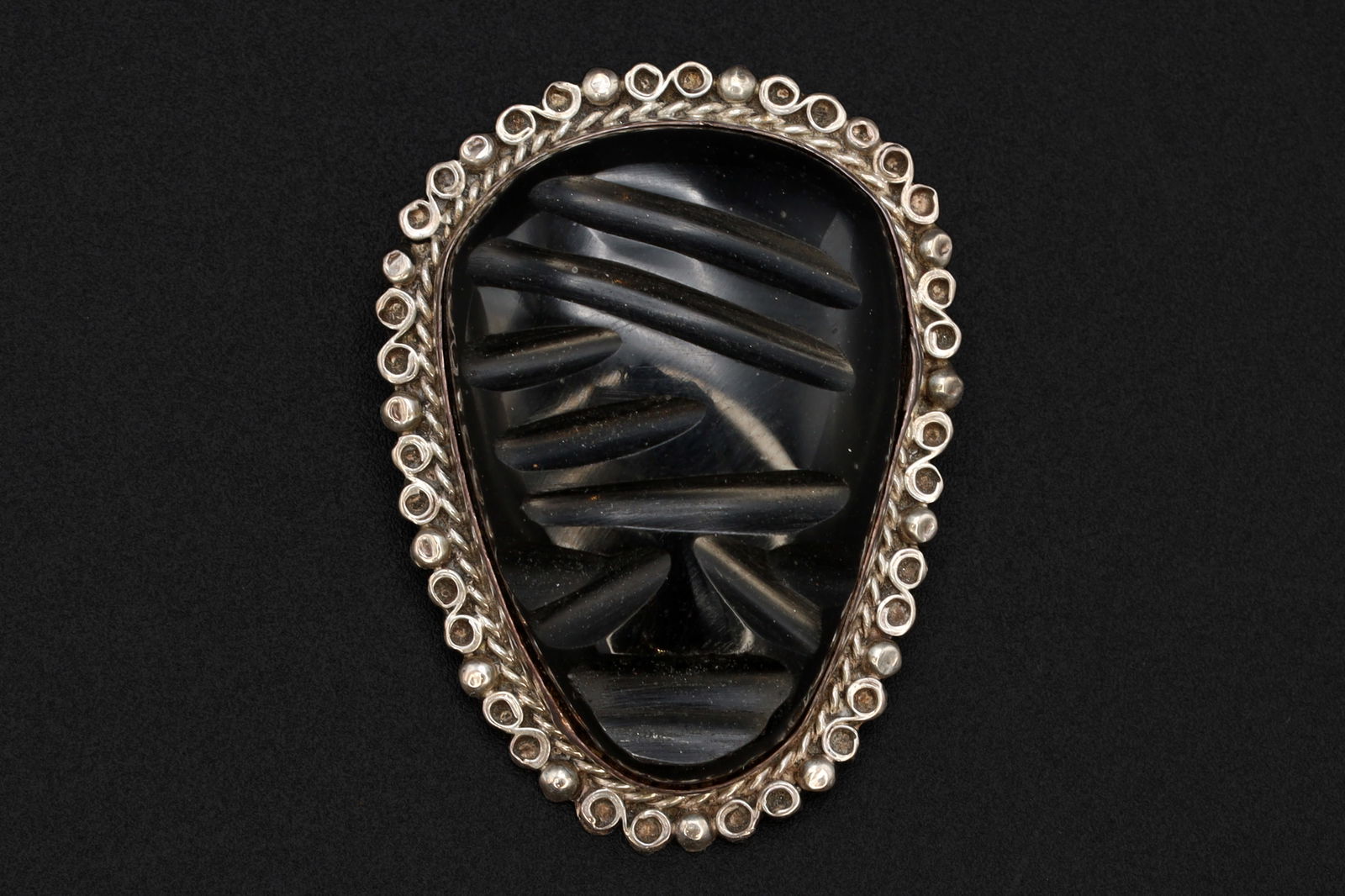 Art Deco Jewelry From Mexico, A Mid Century Brooch Pin On Neo Aztec Design, Sterling Silver And Onyx: Dimensions 2.5 x 1.5 inches. All measurements are approximate. Normal surface wear and aging. Sold exactly as pictured. Vintage 1950s Or Prior, Latin American, Art Deco Jewelry From Mexico, A Mid Cent