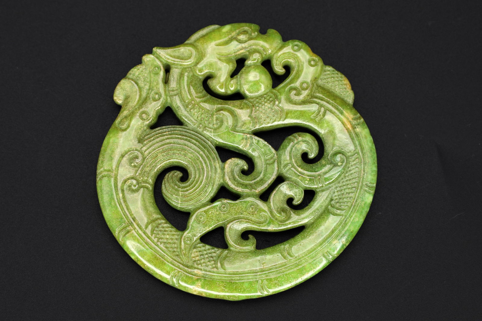 Vintage 1980s Green Pendant With Celestial Dragon, Hand Carved Spinach Stone, Chinese Zodiac: Dimensions, Diameter 2.5 inches, Weight 44 grams. All measurements are approximate. Vintage 1980s Green Jade (Untested, unverified) Pendant With Celestial Dragon, Hand Carved Spinach Jade Like Stone.