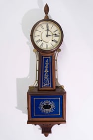 Banjo clock with pendulum and key