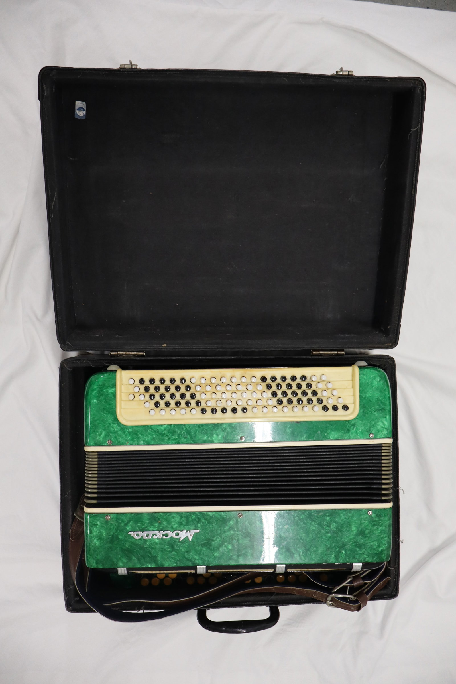 Moskva russain accordion: Moskva russain accordion with carrying case. Dimensions: H:9in L:20in W:15in