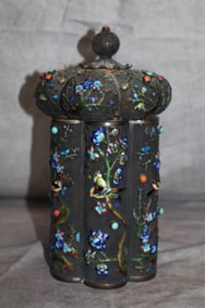 A Chinese parcel-gilt silver and enamel tea caddy