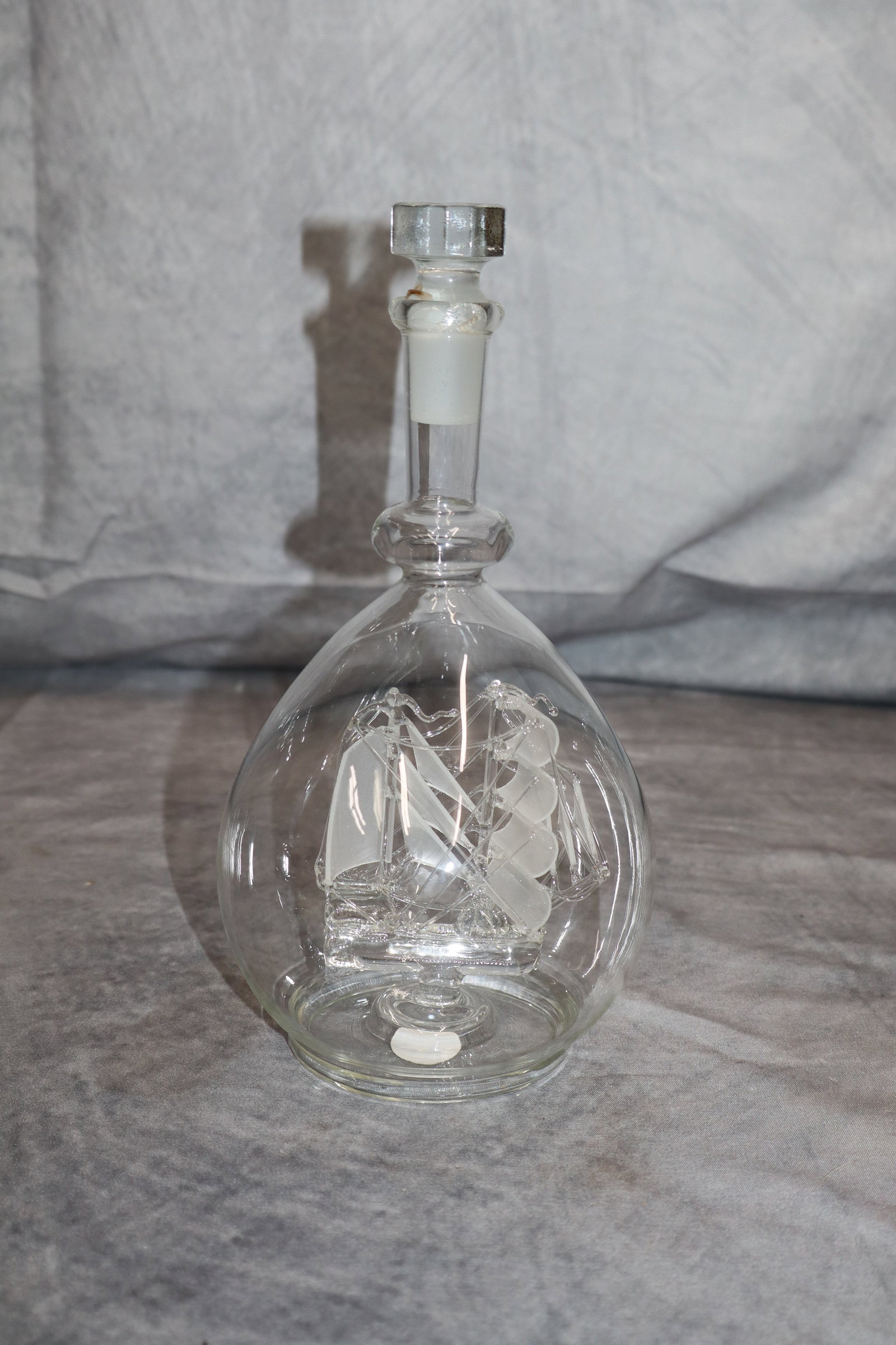 Glass Decanter with ship inside: Glass Decanter with glass ship inside, H9in Dia4.5in