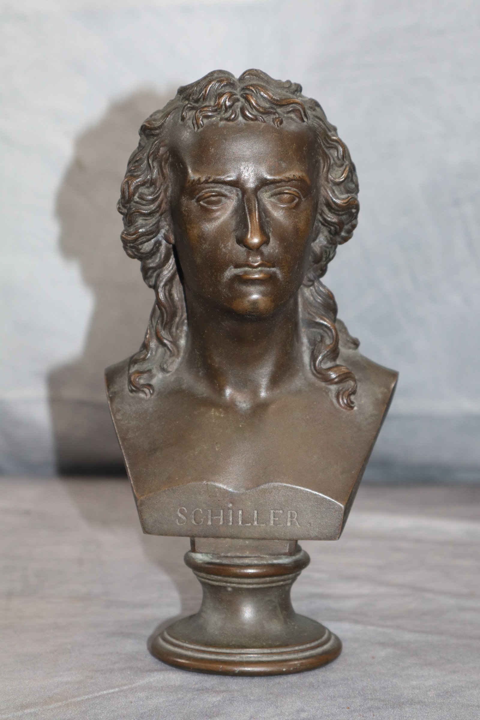 Schiller Bronze Bust: Schiller bronze bust signed and stamped with foundry marks in the back from Hanau Germany and signed E.G. Zimmerman.Dimensions: H:8in L:5in W:3in