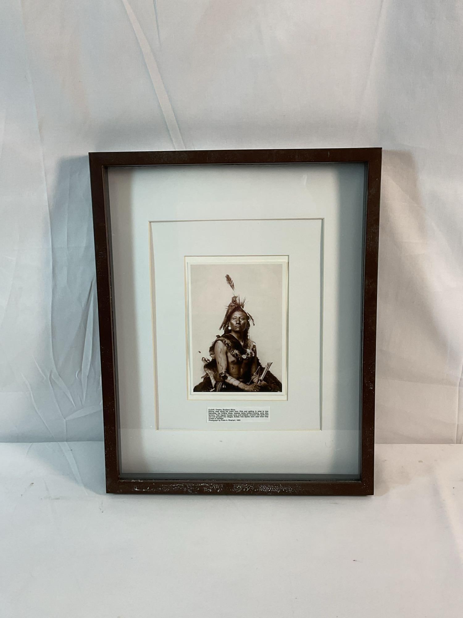 Anqitue Sepia by Frank A. Reinhart(American, 1861-1928): A sepia-toned portrait of a Native American chief, framed in black with a white mat. Reinhart was known for his ethnographic photography of indigenous people in the early 20th century. His portraits c