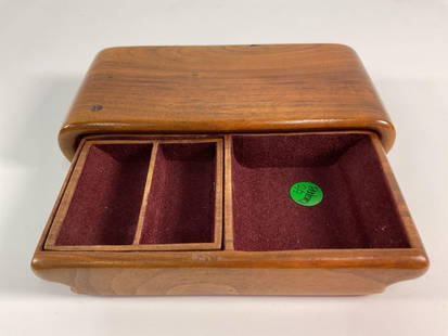 "Vintage Wooden Jewelry Box with Velvet Lining" Richard Rothbard: A handcrafted rectangular wooden jewelry box with a sliding lid and a smooth natural wood grain finish. The interior is lined with deep burgundy velvet, divided into two compartments for organizing sm