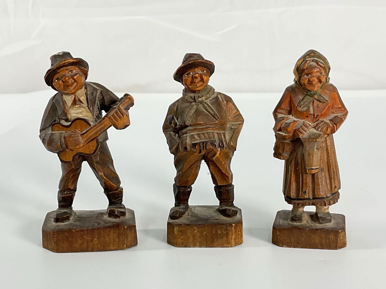 3 Hand-Carved Wooden Figurines (1 of 4)