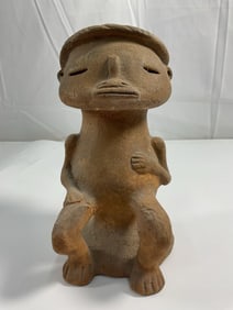Seated male figure Pre-Columbian