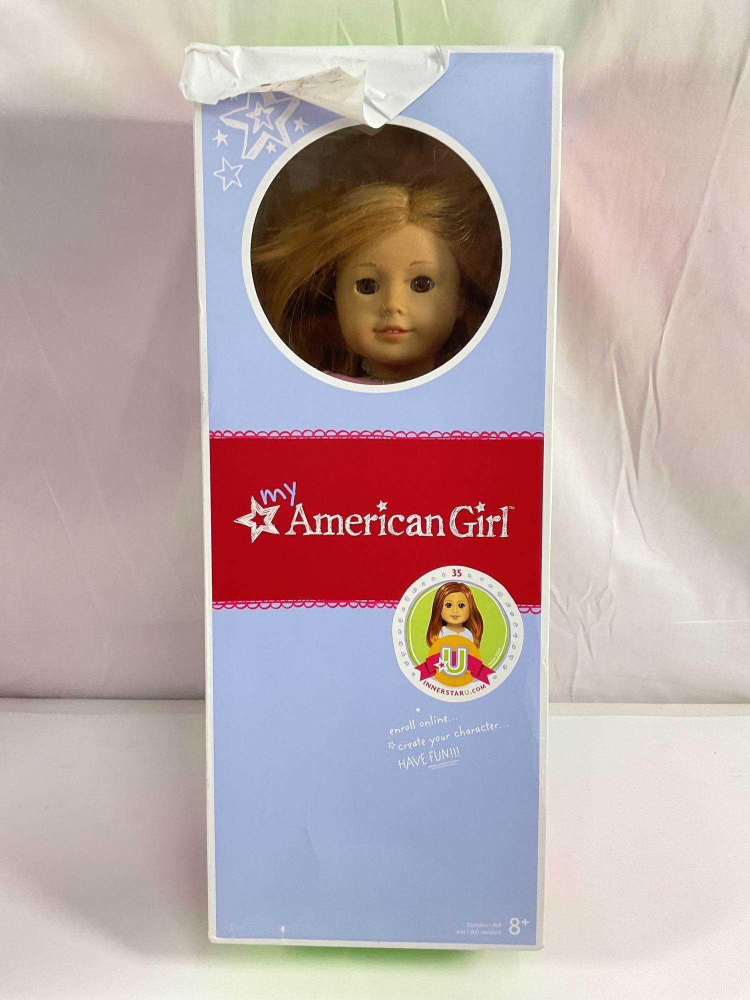 My American Girl Doll: This is a My American Girl Doll from the American Girl doll line. These dolls are part of a customizable collection where children can choose features such as hair color, eye color, skin tone, and acc