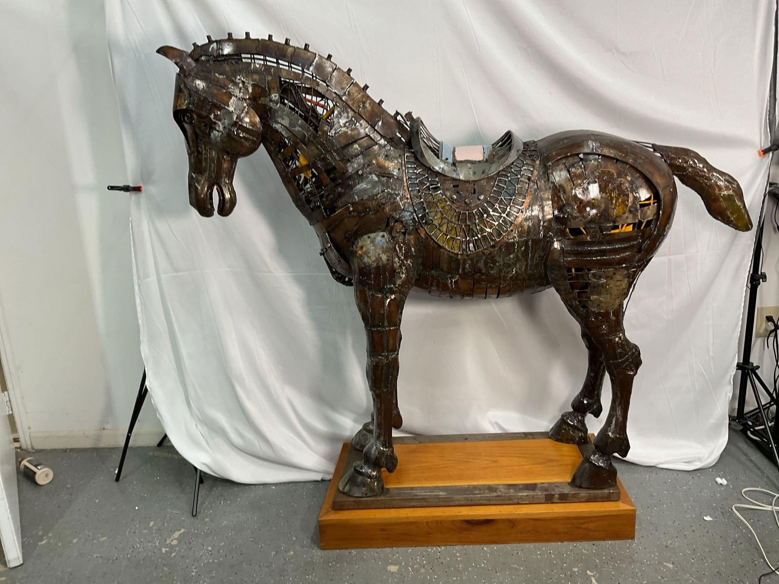Alirio Palacios (Venezula, 1938-2015) Life Size Horse Sculpture: One of a kind monumental real life size horse sculpture by Venezuelan artist Alirio Palacios. The piece is all metal and mounted on a wooden base. In Excellent condition. Dimensions: H:65in L:72in W:2