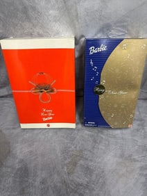 2 New Year Barbies. Never opened